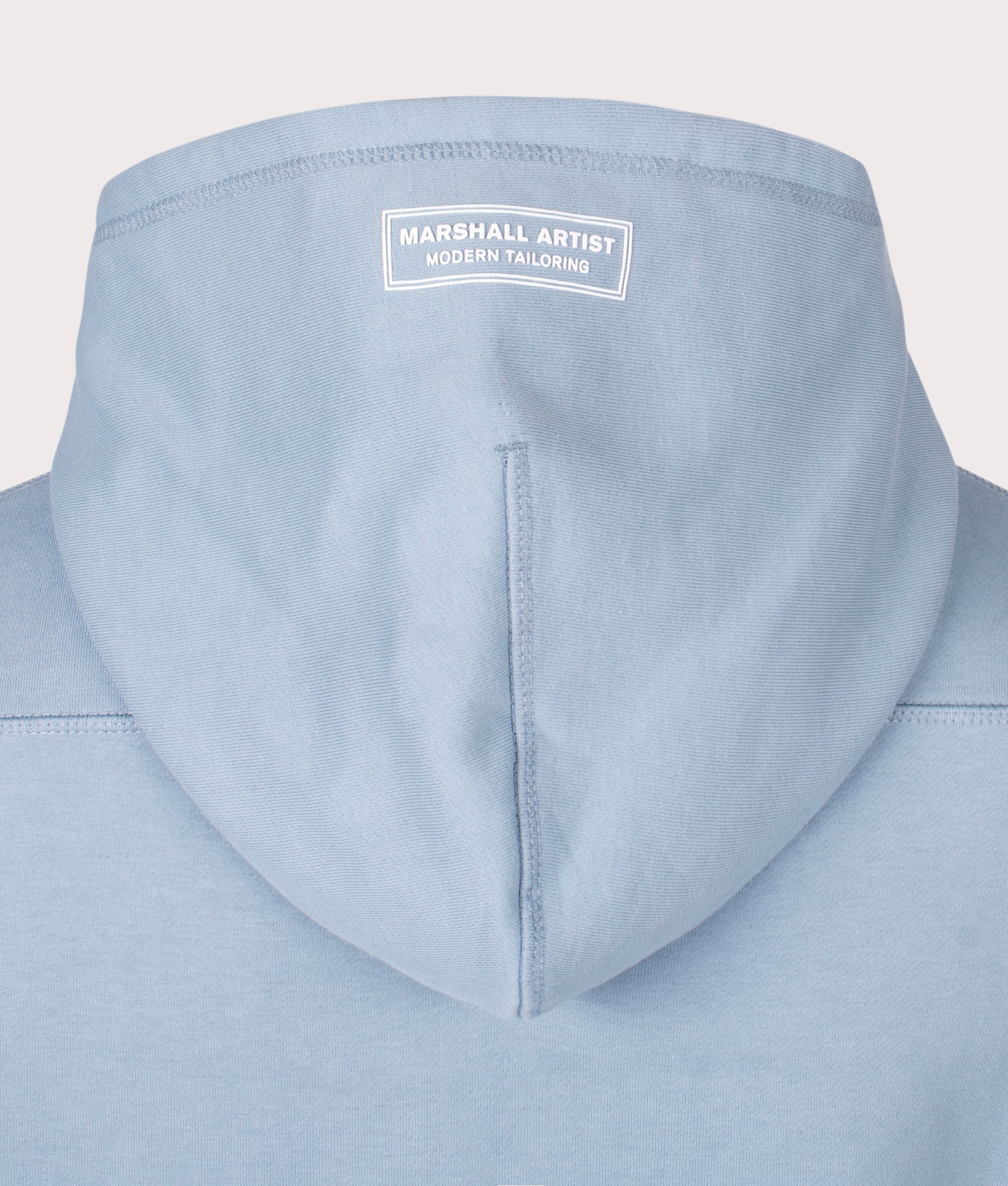 Siren Zip Through Hoodie in Dusk Blue by Marshall Artist. Detail back shot at EQVVS.
