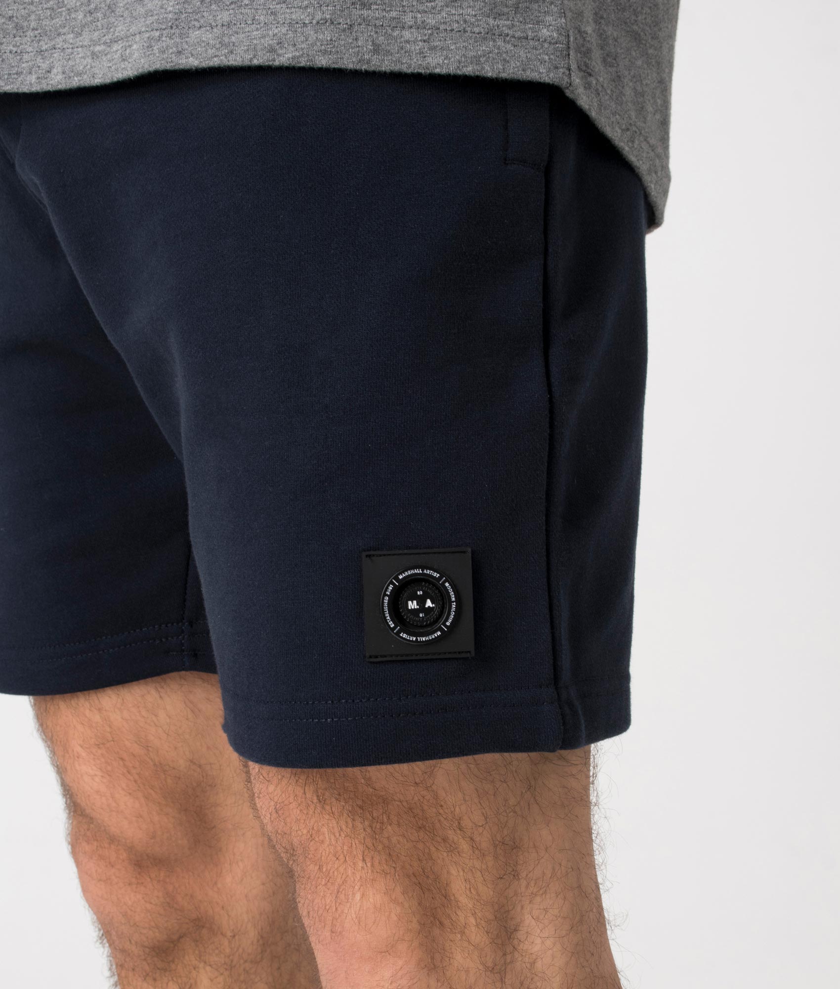 Siren Jersey Shorts in Navy by Marshall Artist. Detail shot at EQVVS.