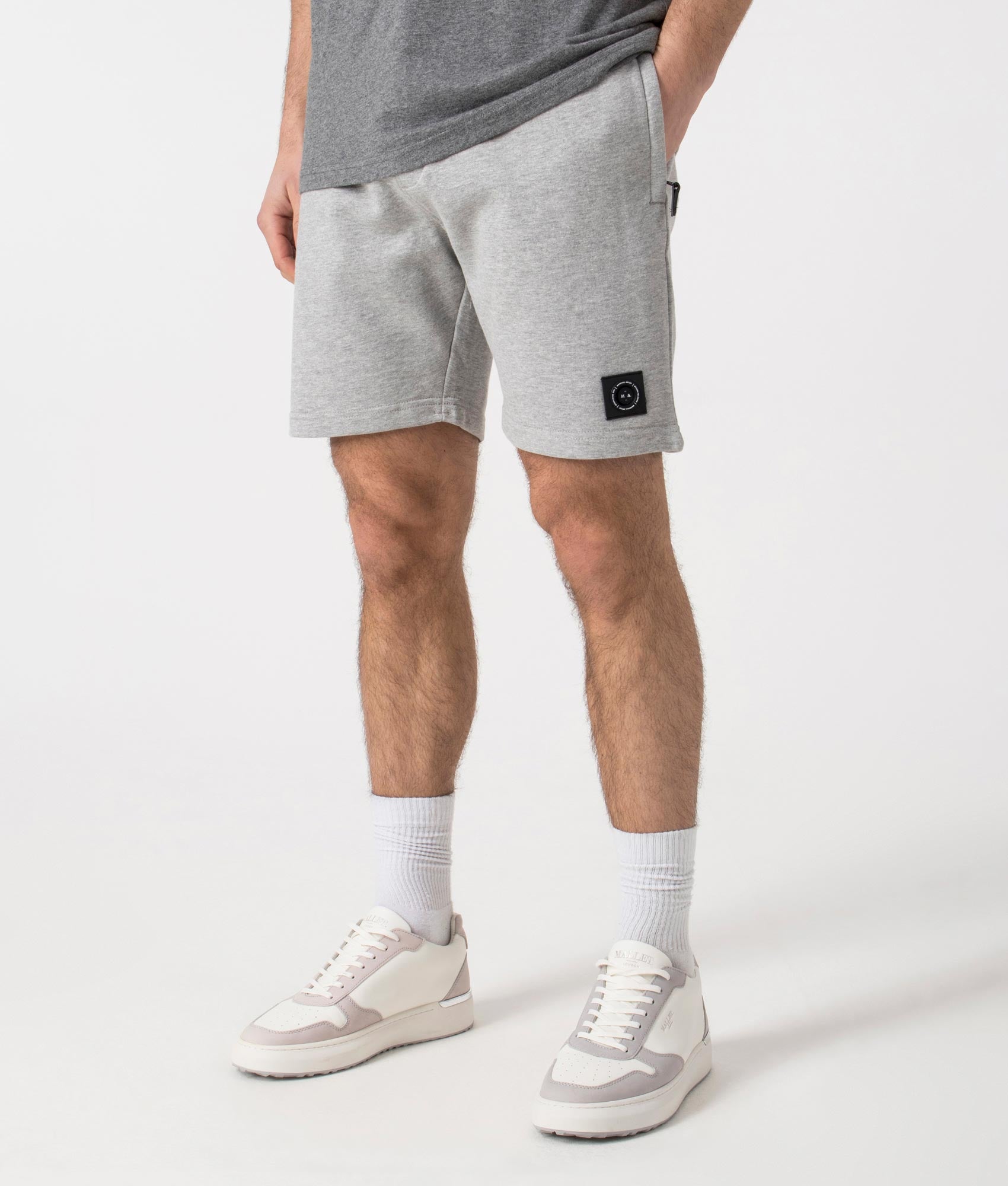 Siren Jersey Shorts in Grey Marl by Marshall Artist. Side angle shot at EQVVS.