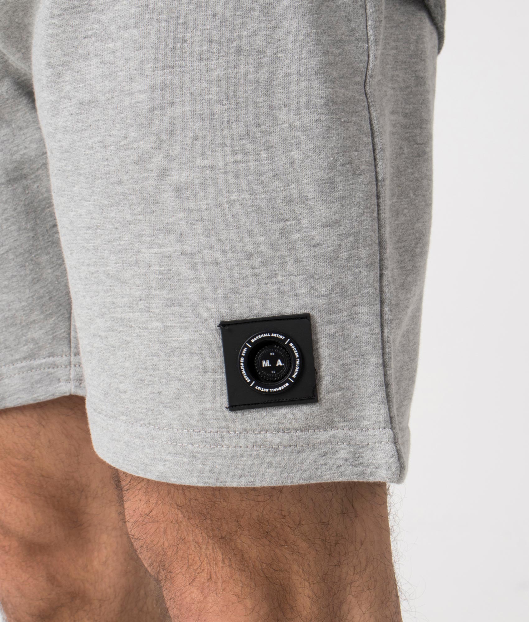 Siren Jersey Shorts in Grey Marl by Marshall Artist. Detail shot at EQVVS.