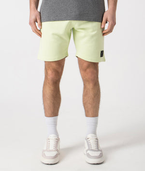 Siren Jersey Shorts in Lime by Marshall Artist. Front angle shot at EQVVS.