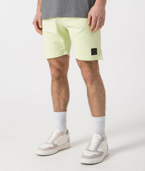 Siren Jersey Shorts in Lime by Marshall Artist. Side angle shot at EQVVS.