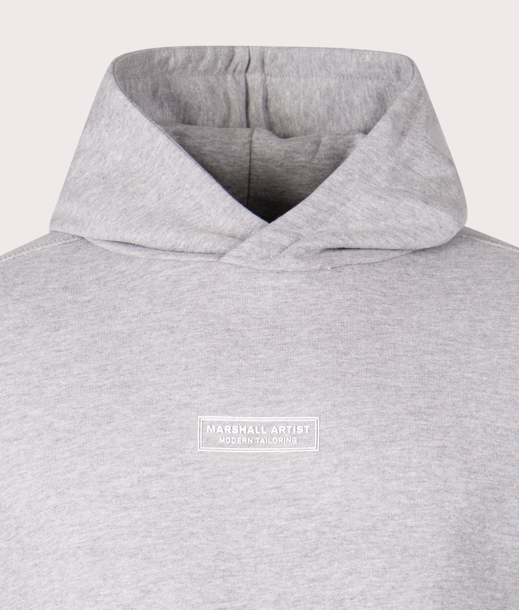 Marshall Artist Siren Overhead Hoodie in 004 grey marl chest detail shot at EQVVS