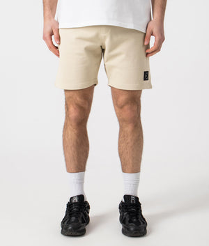 Siren Jersey Shorts in Sandstone by Marshall Artist. Front angle shot at EQVVS.