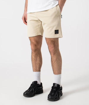 Siren Jersey Shorts in Sandstone by Marshall Artist. Side angle shot at EQVVS.