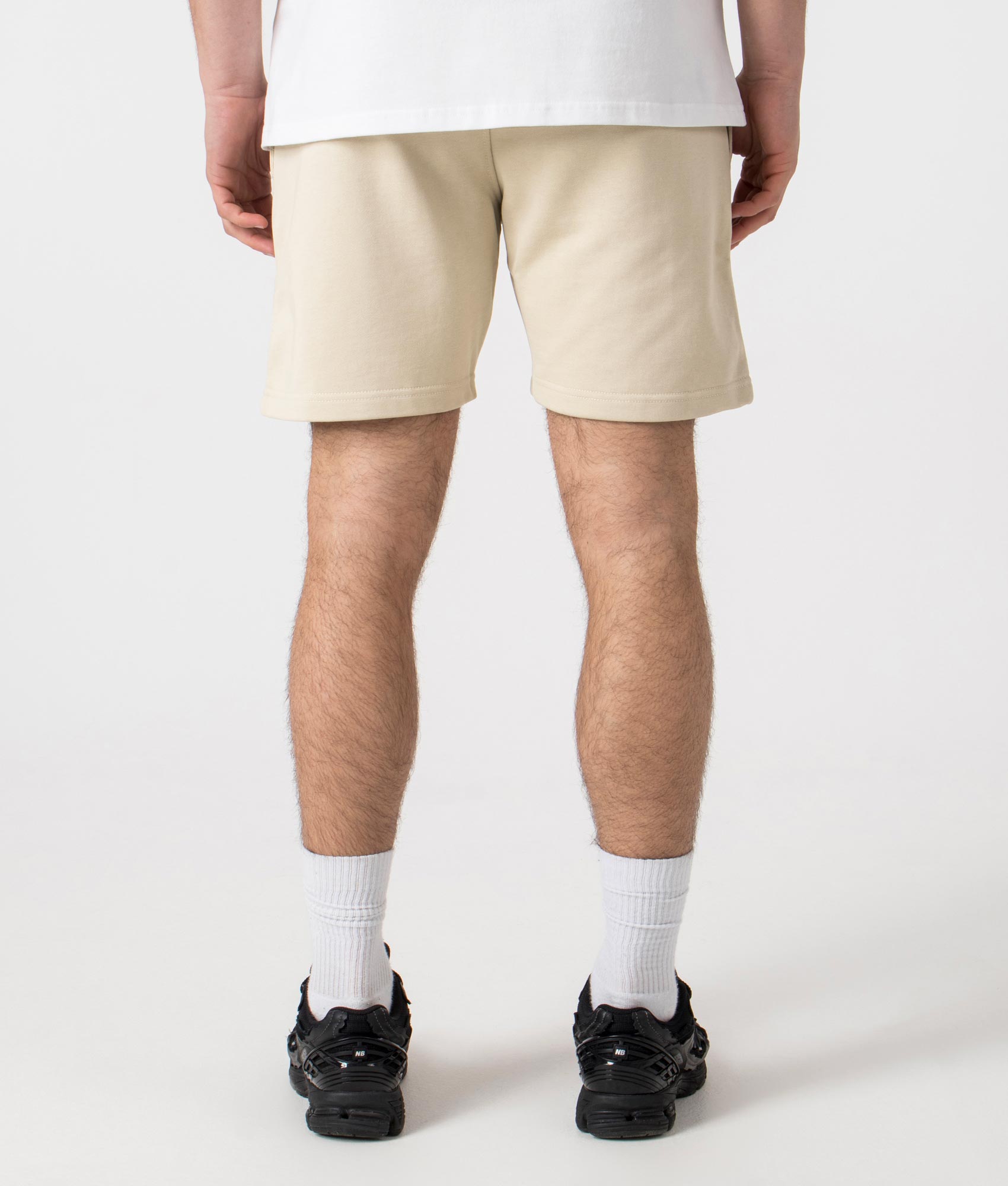Siren Jersey Shorts in Sandstone by Marshall Artist. Back angle shot at EQVVS.