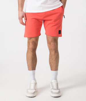 Siren Jersey Shorts in Coral by Marshall Artist. Front angle shot at EQVVS.