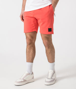 Siren Jersey Shorts in Coral by Marshall Artist. Side angle shot at EQVVS.
