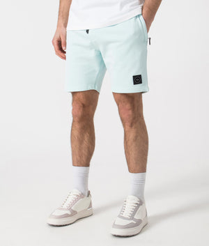 Siren Jersey Shorts in Sky Blue by Marshall Artist. Side angle shot at EQVVS.