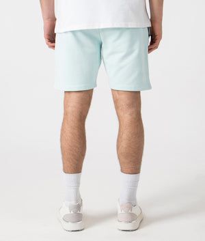 Siren Jersey Shorts in Sky Blue by Marshall Artist. Back angle shot at EQVVS.