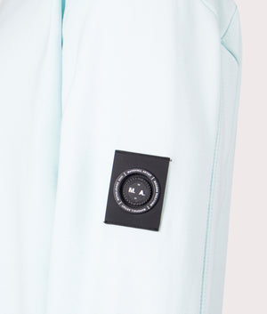 Discover the Siren Overhead Hoodie in Sky Blue, 100% Cotton Detail Shot at EQVVS