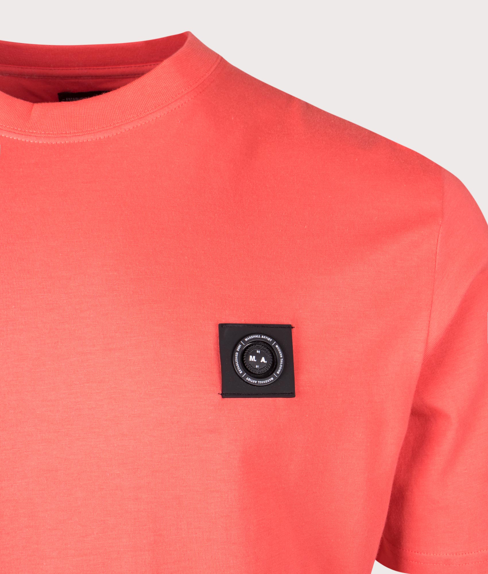 Siren T-Shirt in Coral by Marshall Artist. Detail shot at EQVVS.