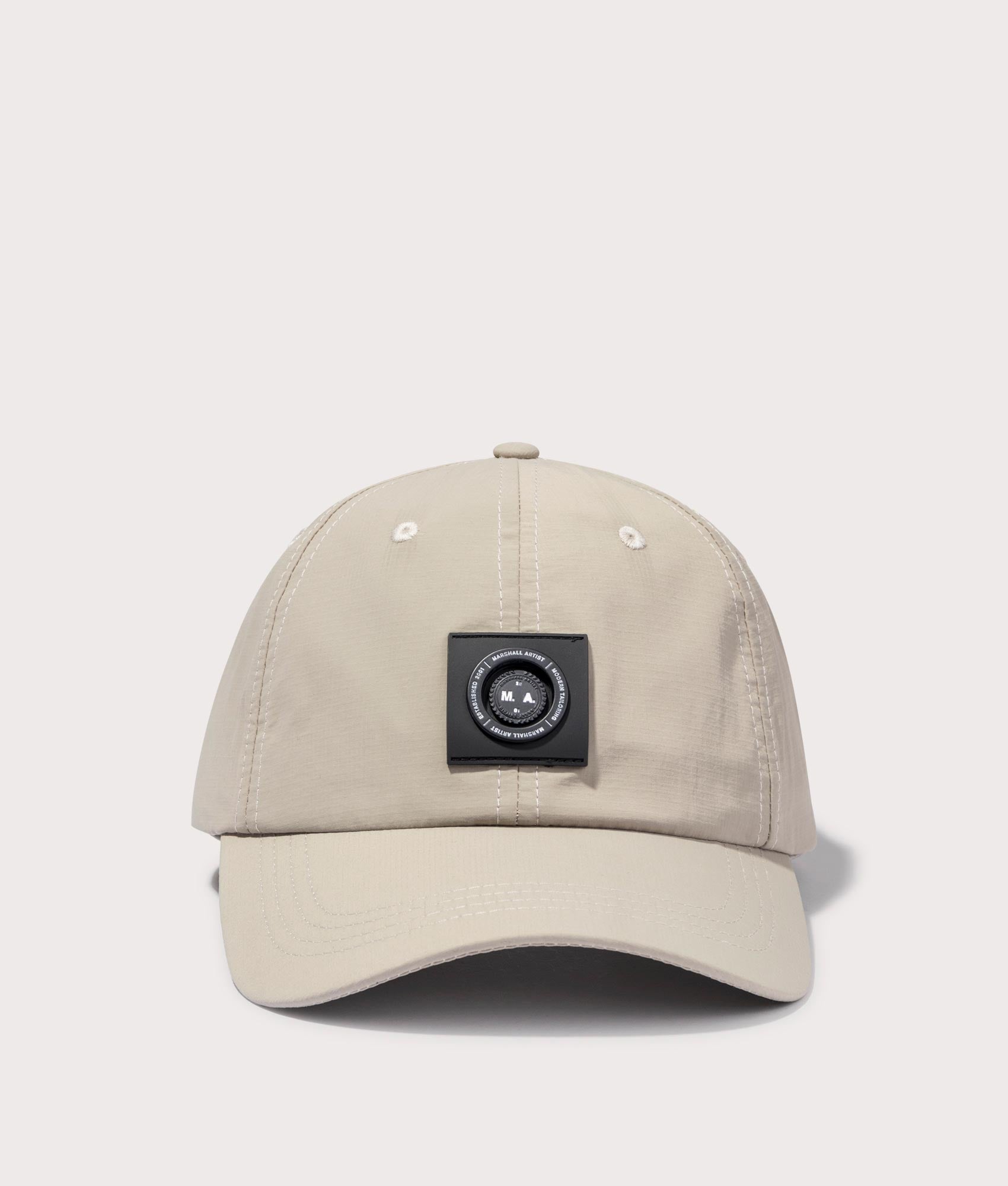 Siren Nylon Ripstop Cap in Stone by Marshall Artist. EQVVS Front Angle Shot.