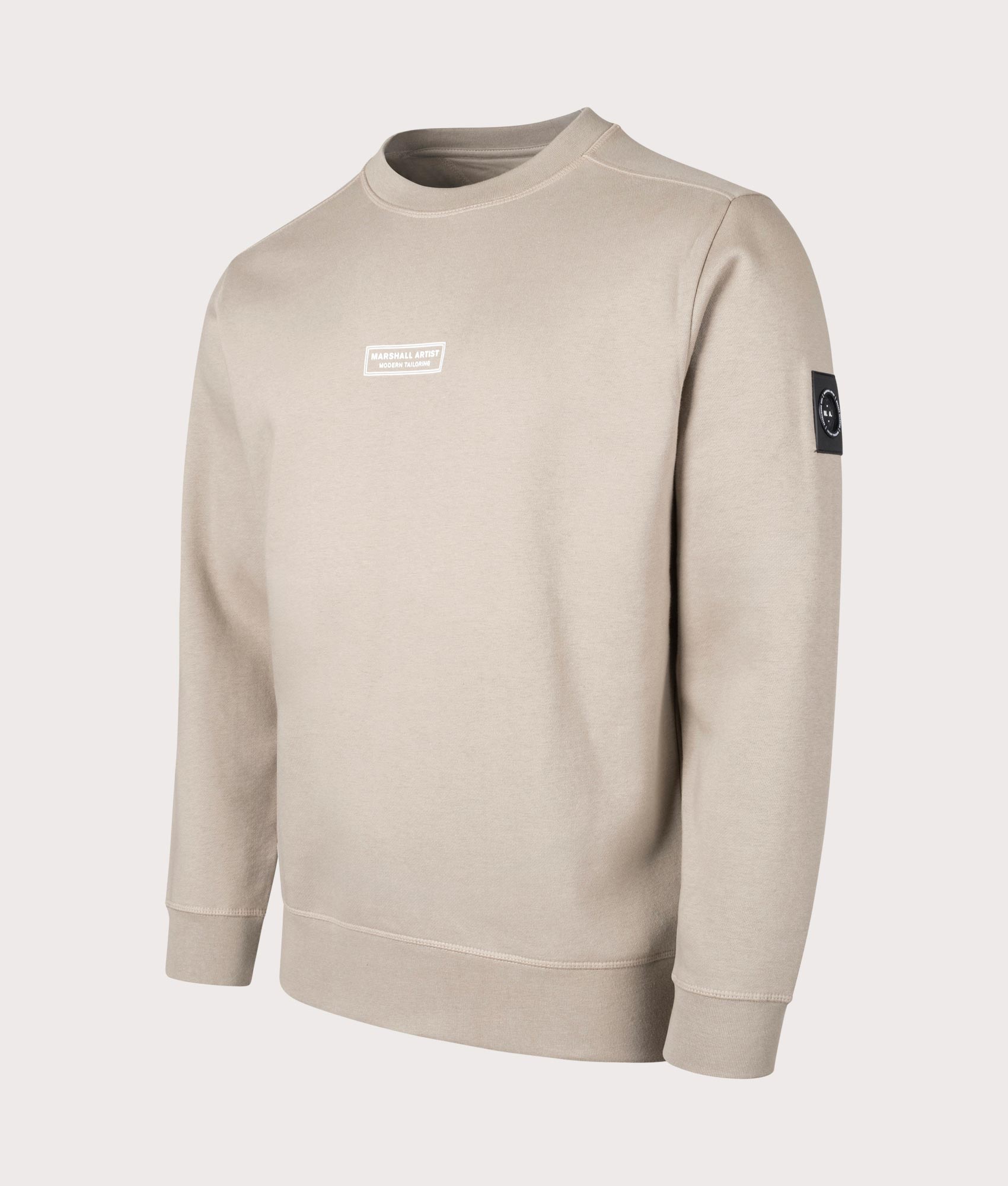 Siren Sweatshirt in Stone by Marshall Artist. Shot at EQVVS. Angle shot. 