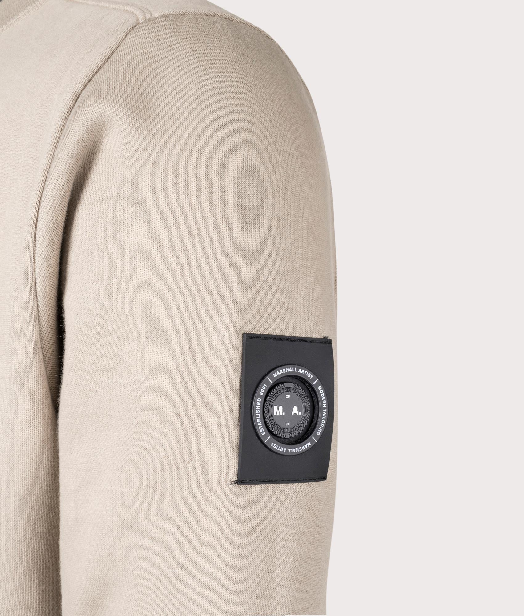 Siren Sweatshirt in Stone by Marshall Artist. Shot at EQVVS. Detail shot. 