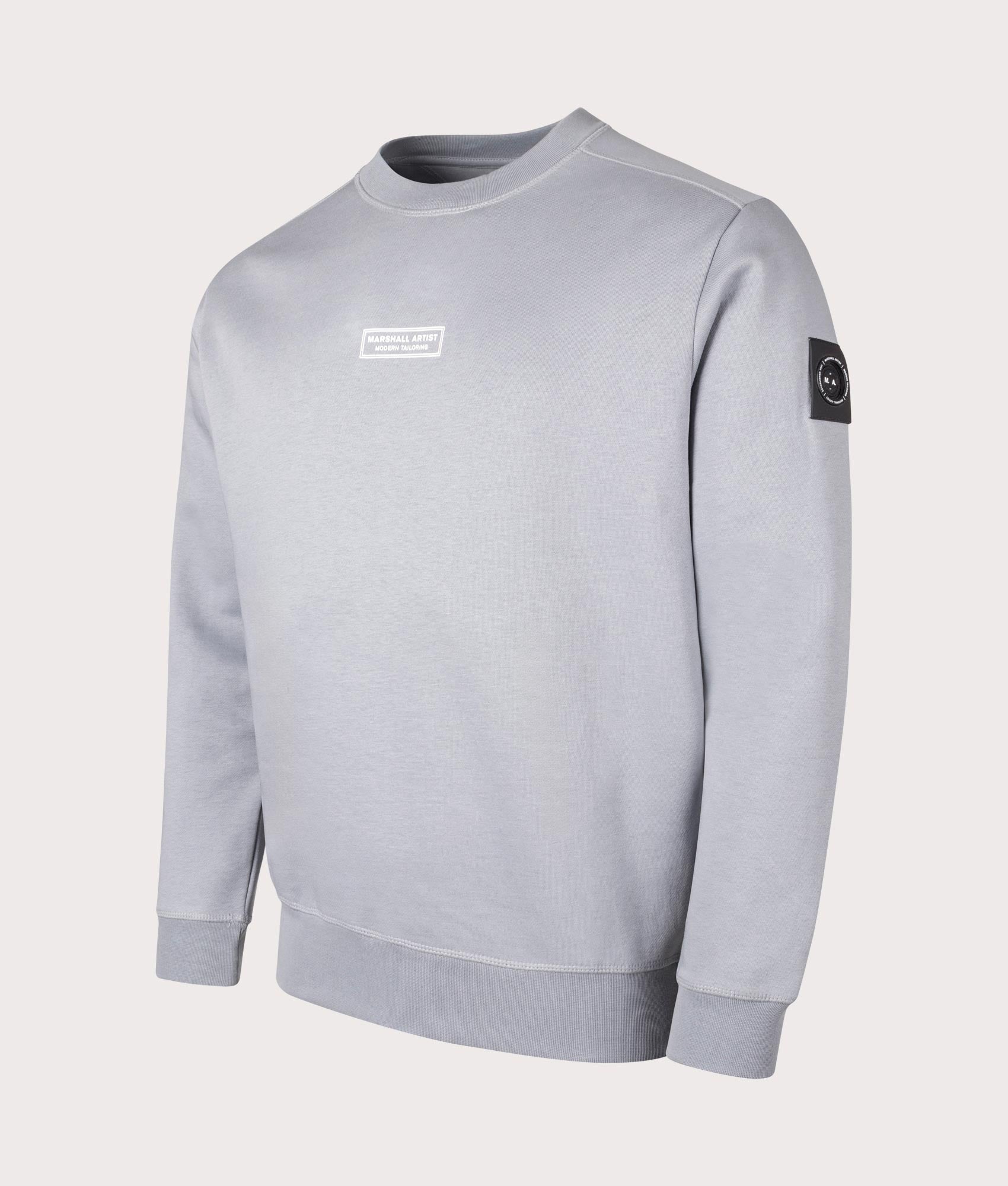 Siren Sweatshirt in Nardo Grey by Marshall Artist. Shot at EQVVS. Angle shot. 