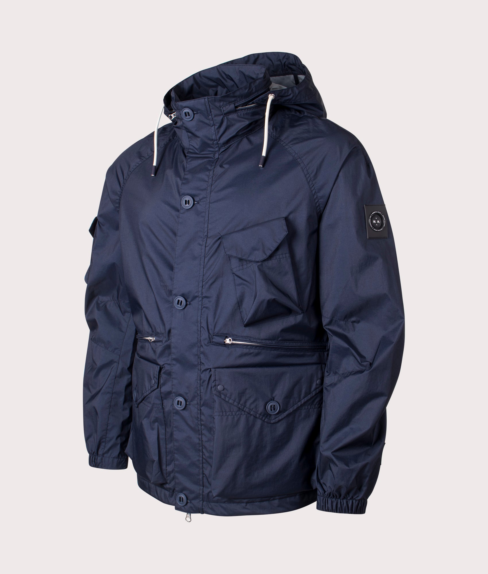 Marshall Artist Coastal Jacket in Navy. Shot at EQVVS. Side shot