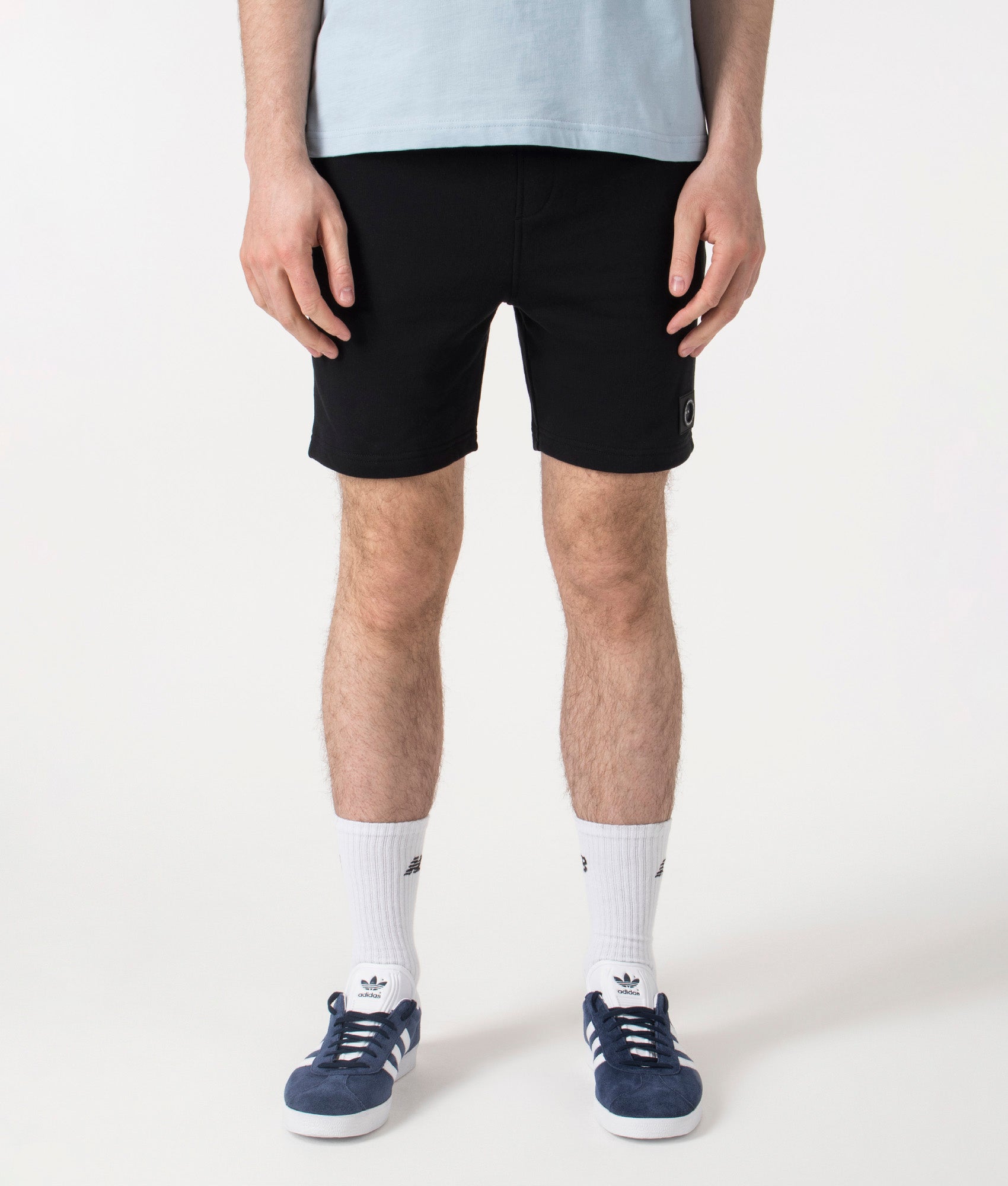 Marshall Artist Siren Loopback Shorts in Black at EQVVS. Front Shot.