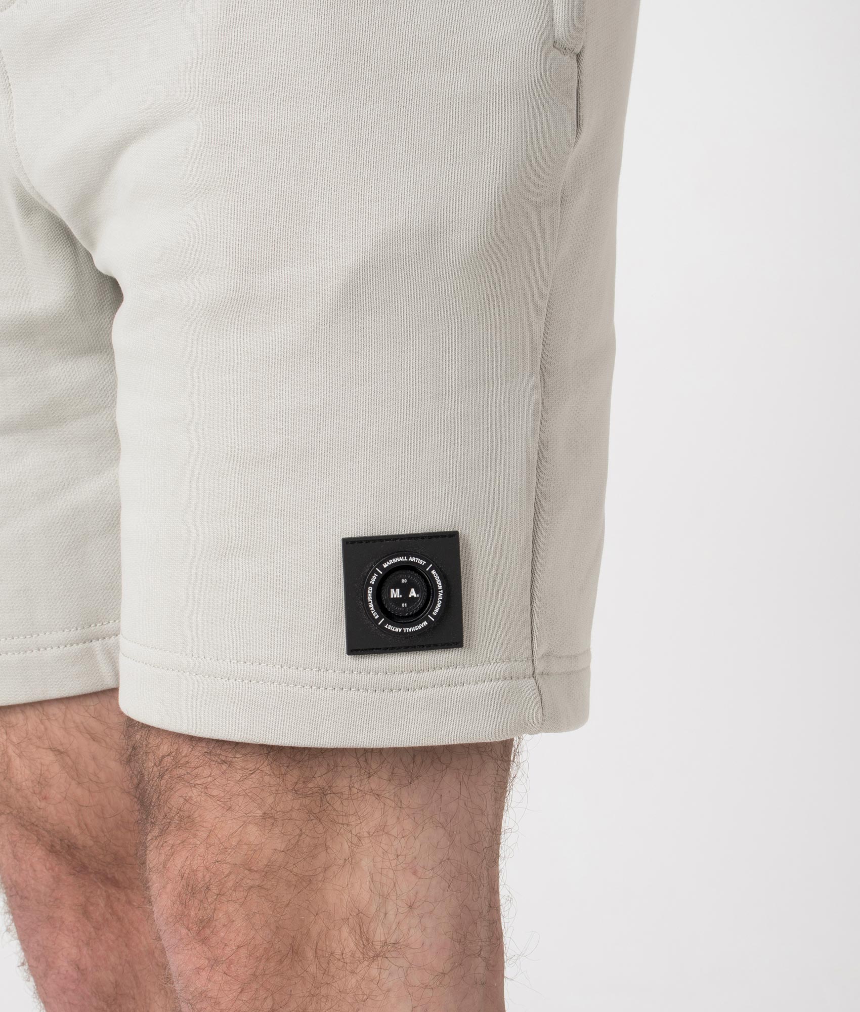 Marshall Artist Siren Shorts in Dove Grey at EQVVS. Detail Shot.