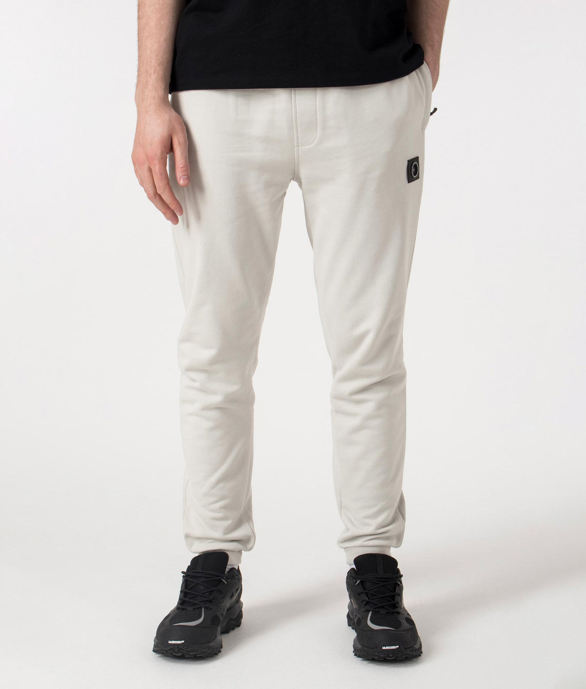 Marshall Artist Relaxed Fit Siren Joggers in Dove Grey at EQVVS. Front shot.