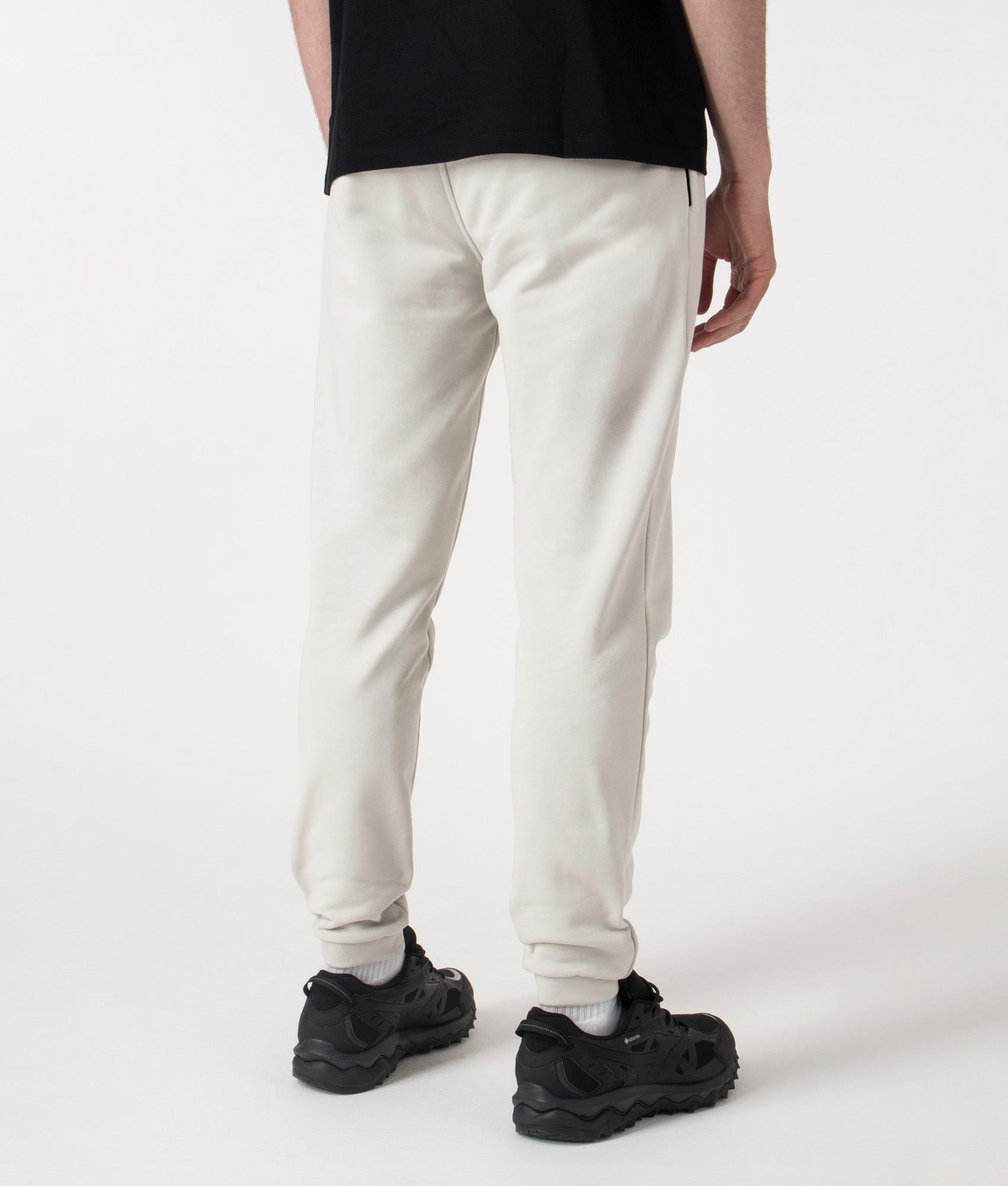 Marshall Artist Relaxed Fit Siren Joggers in Dove Grey at EQVVS. Angle Back shot.