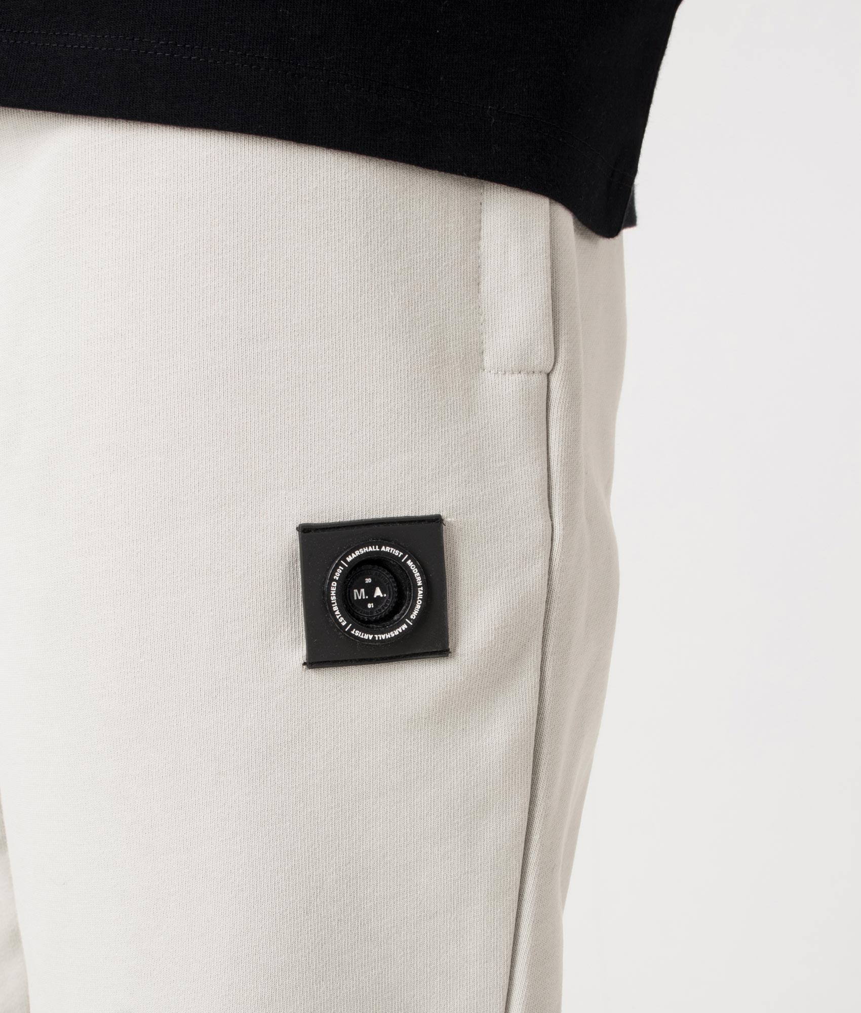 Marshall Artist Relaxed Fit Siren Joggers in Dove Grey at EQVVS. Detail shot.