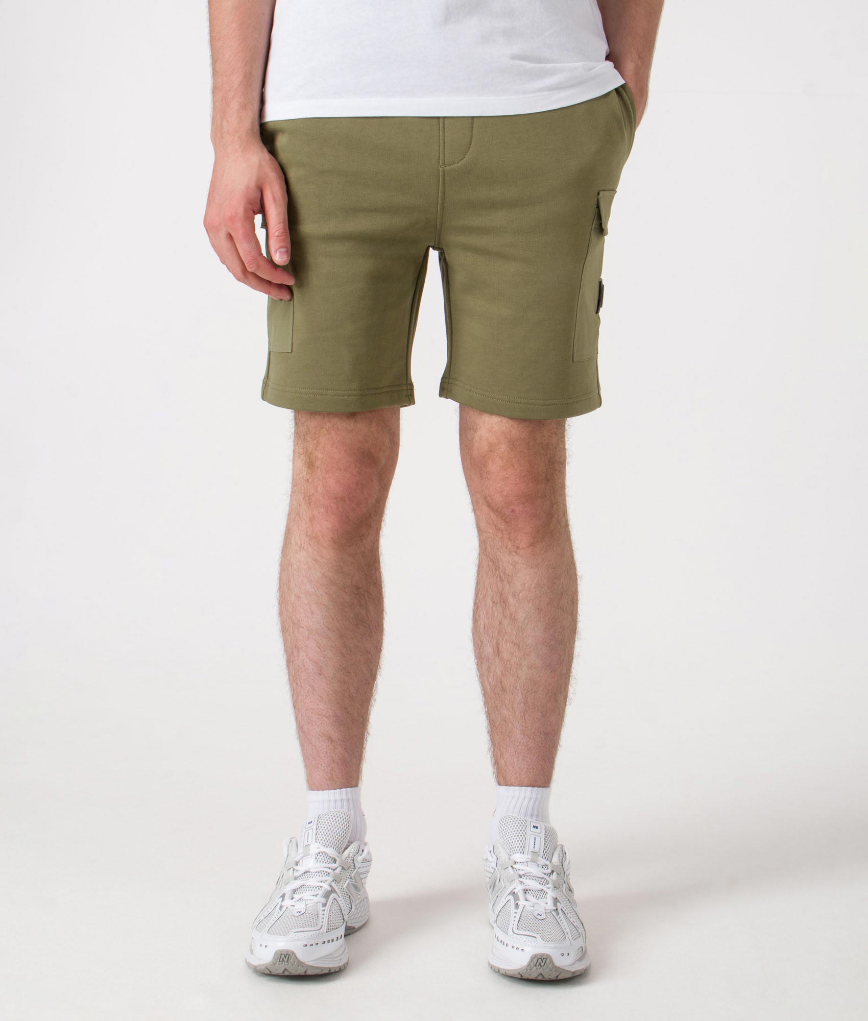 Aksu Jersey Cargo Shorts. Shot by EQVVS. Model front shot.
