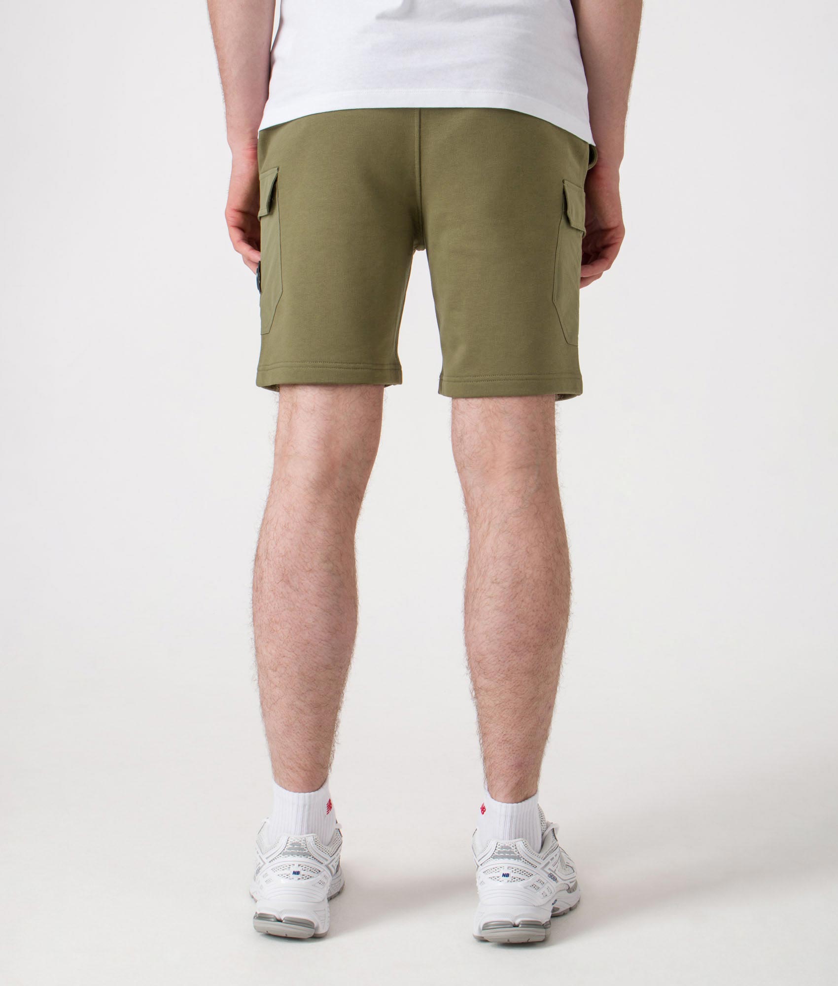 Aksu Jersey Cargo Shorts. Shot by EQVVS. Model back shot.