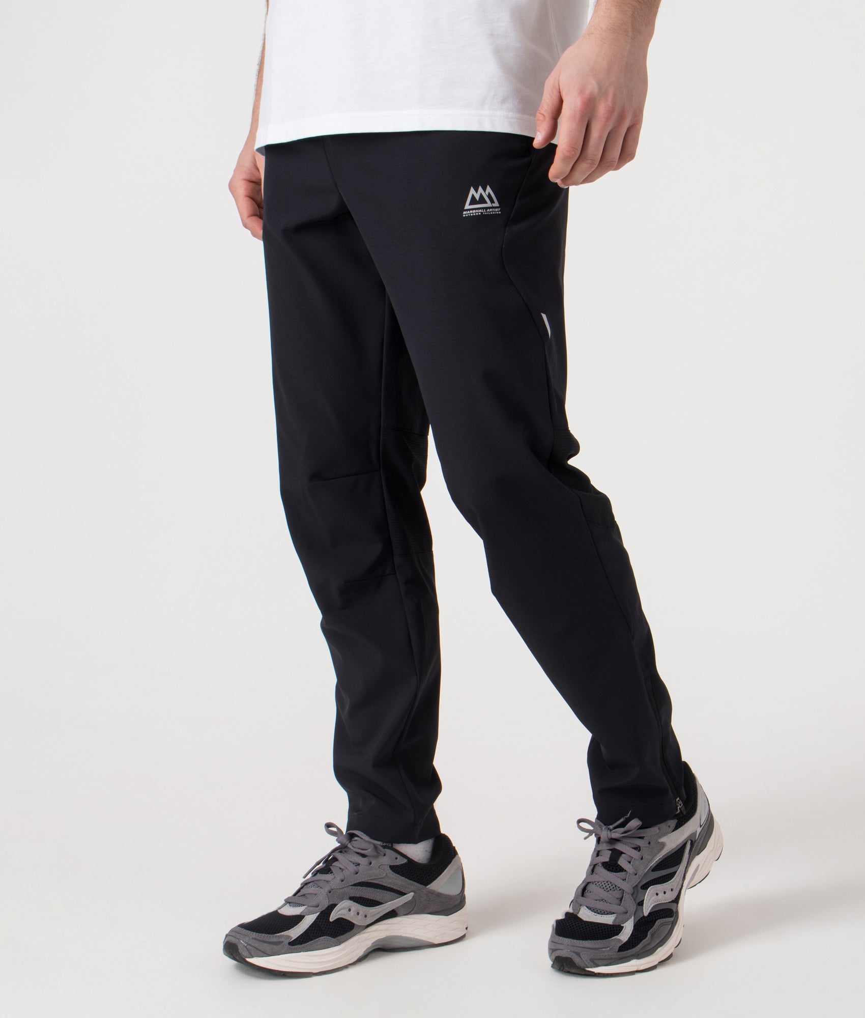 Strike Track Pants. Shot by EQVVS. Front angled shot.