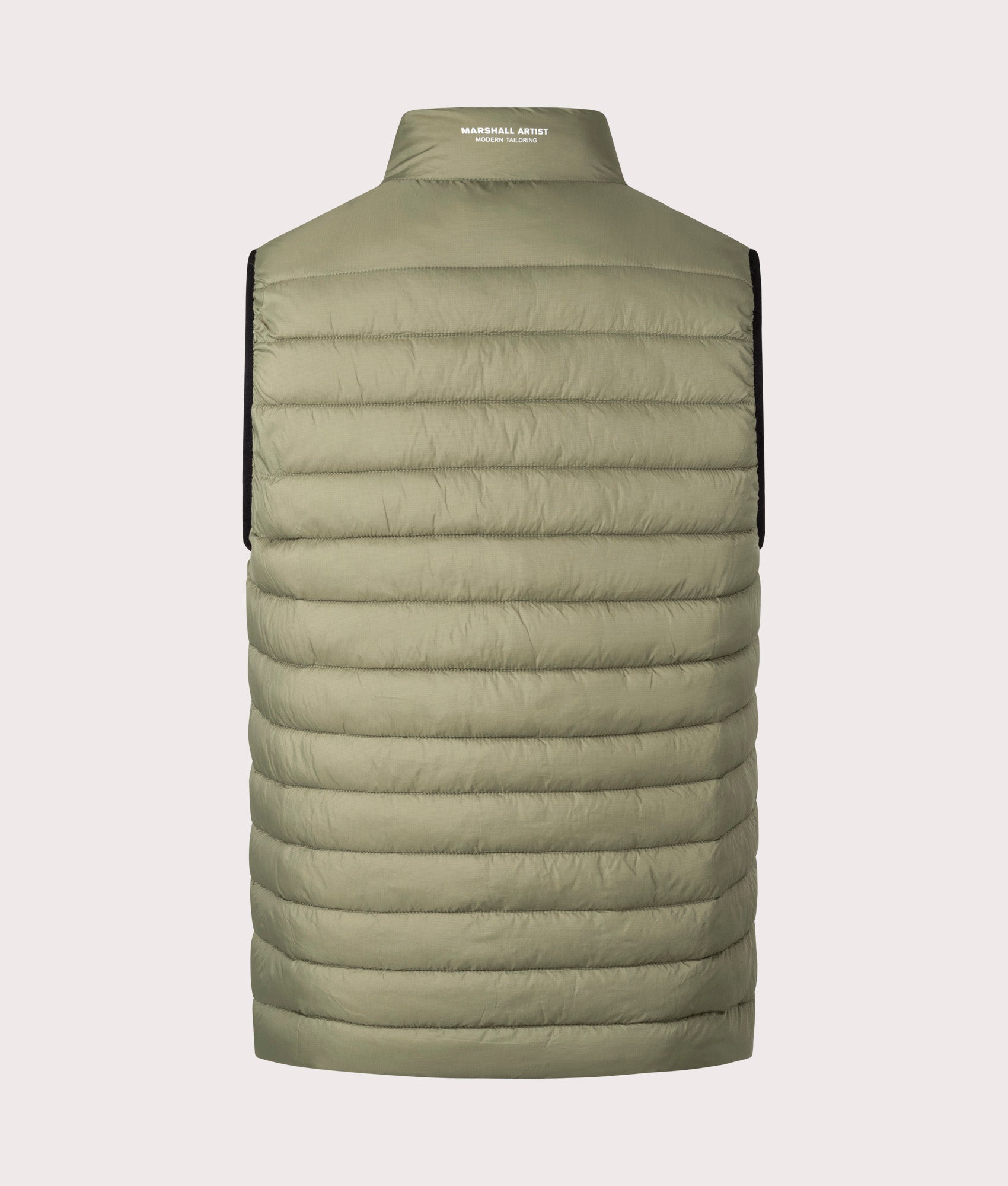 Oakdale Bubble Vest by Marshall Artist in Khaki. Shot by EQVVS. Back shot.