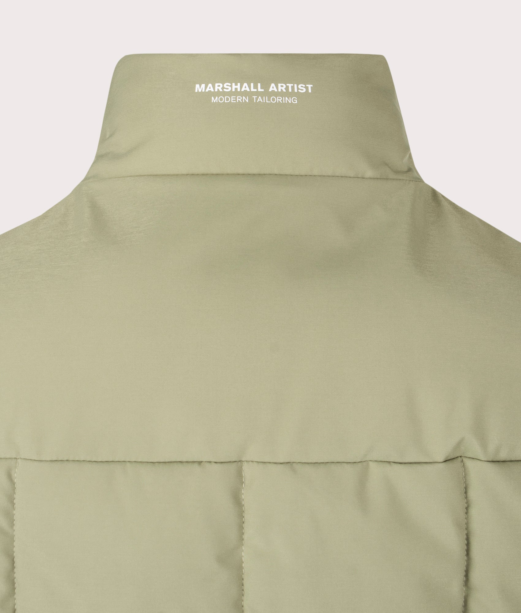 Capilano Bubble Vest by Marshall Artist in Clay. Shot by EQVVS. Back detail shot.