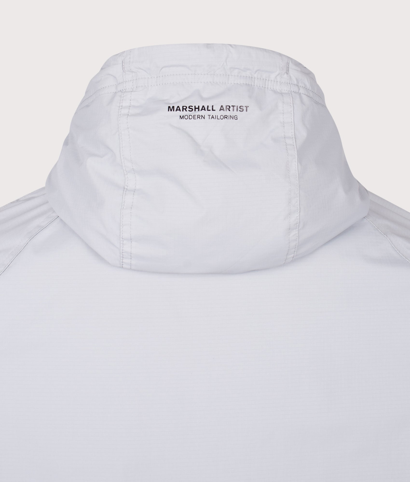 Blackridge Jacket by Marshall Artist in Ghost Grey. Shot by EQVVS. Back detail shot.