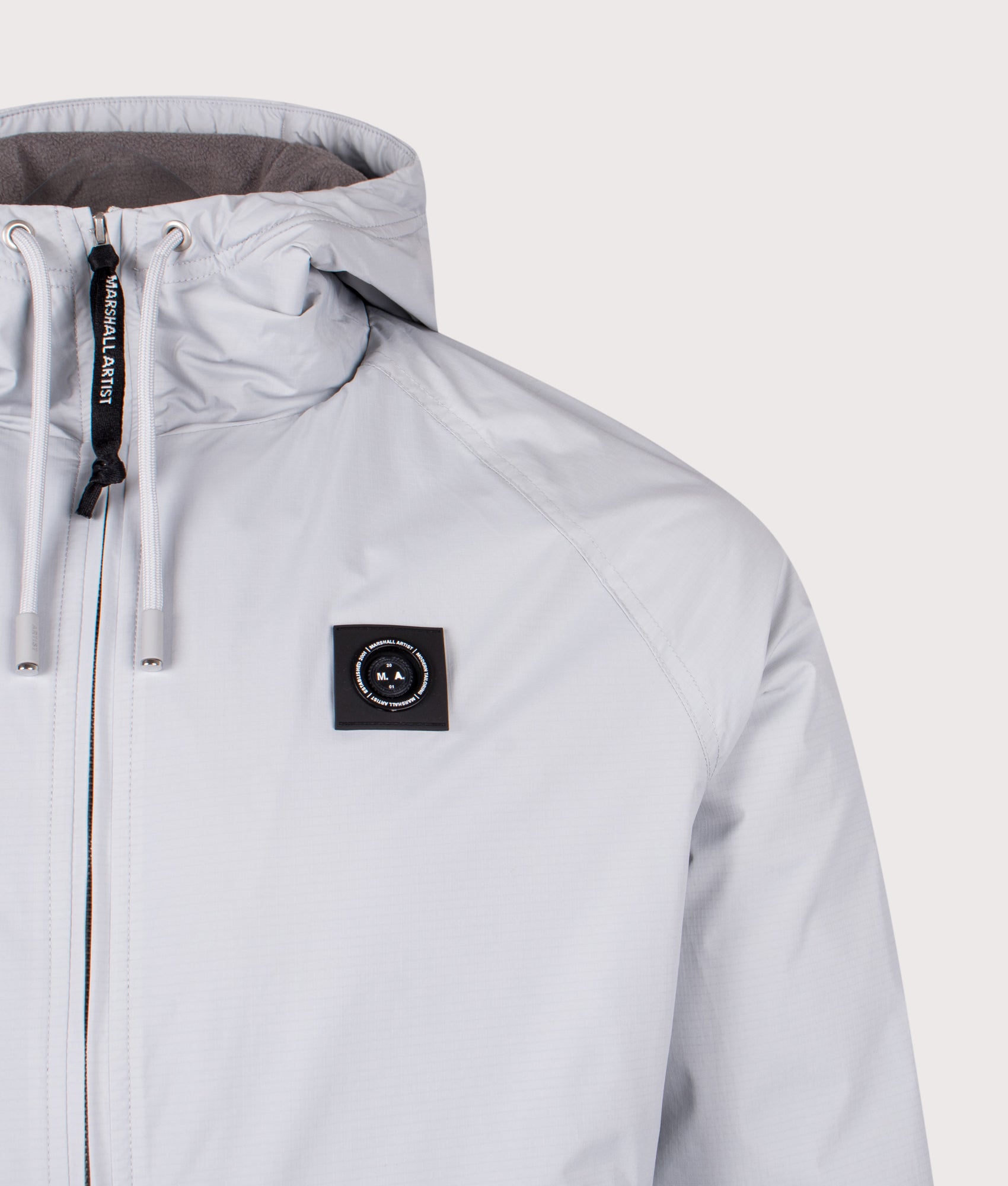 Blackridge Jacket by Marshall Artist in Ghost Grey. Shot by EQVVS. Front detail shot.