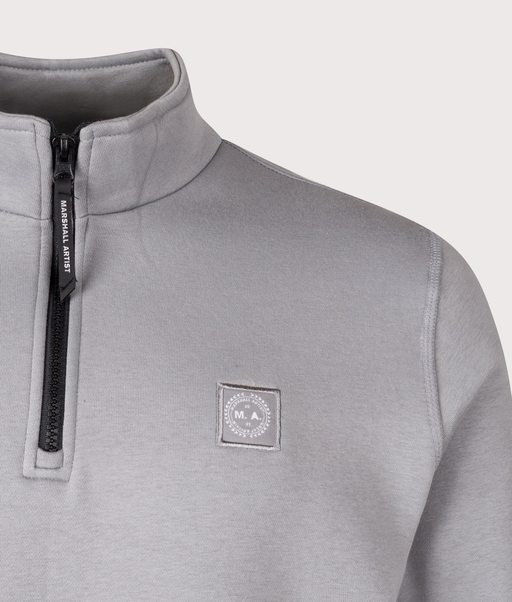 Marchio Quarter Zip Sweatshirt by Marshall Artist in Nardo Grey. Shot by EQVVS. Detail shot.