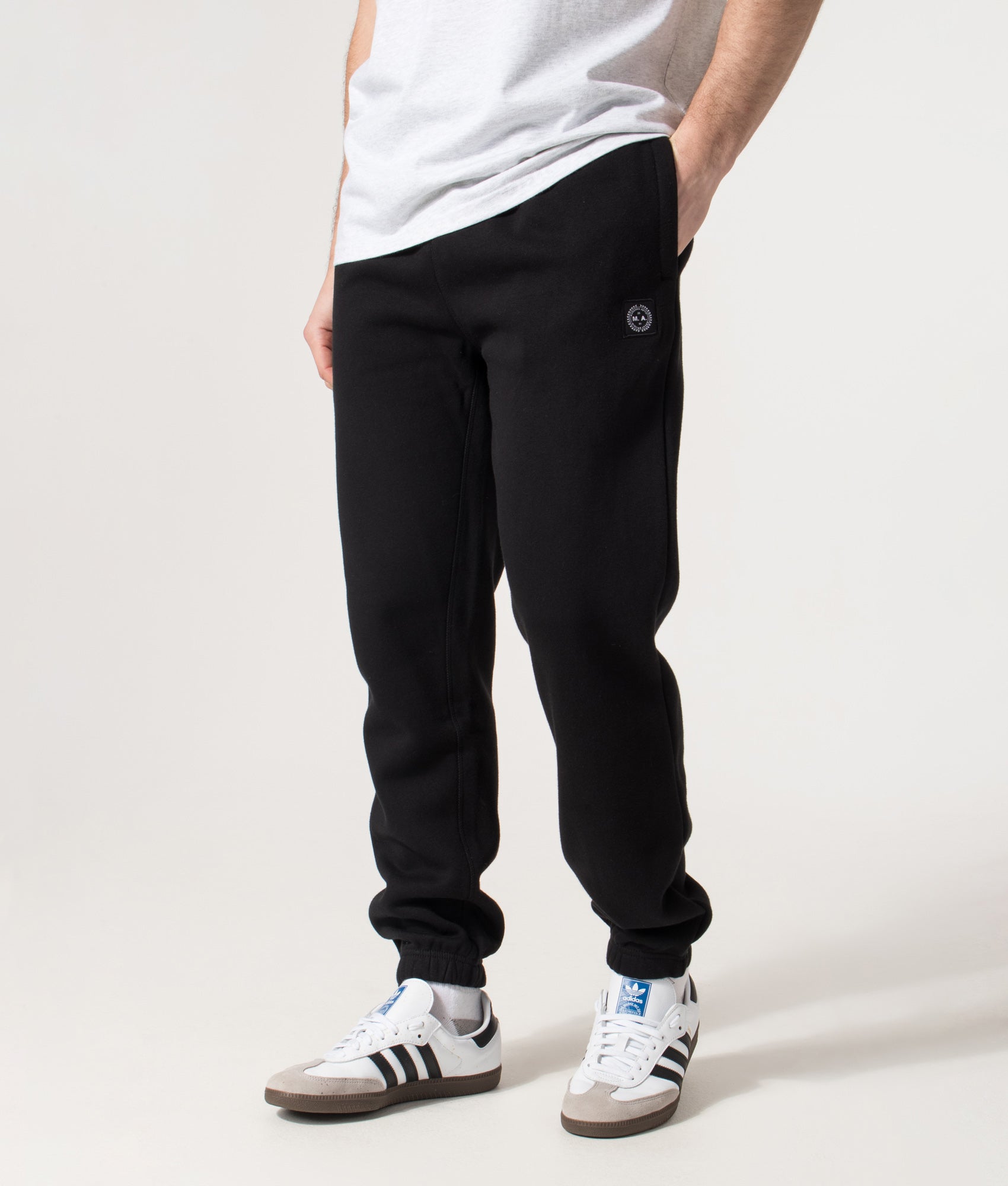 Marshall Artist Marchio Joggers in Black at EQVVS Menswear. Angled model front shot.