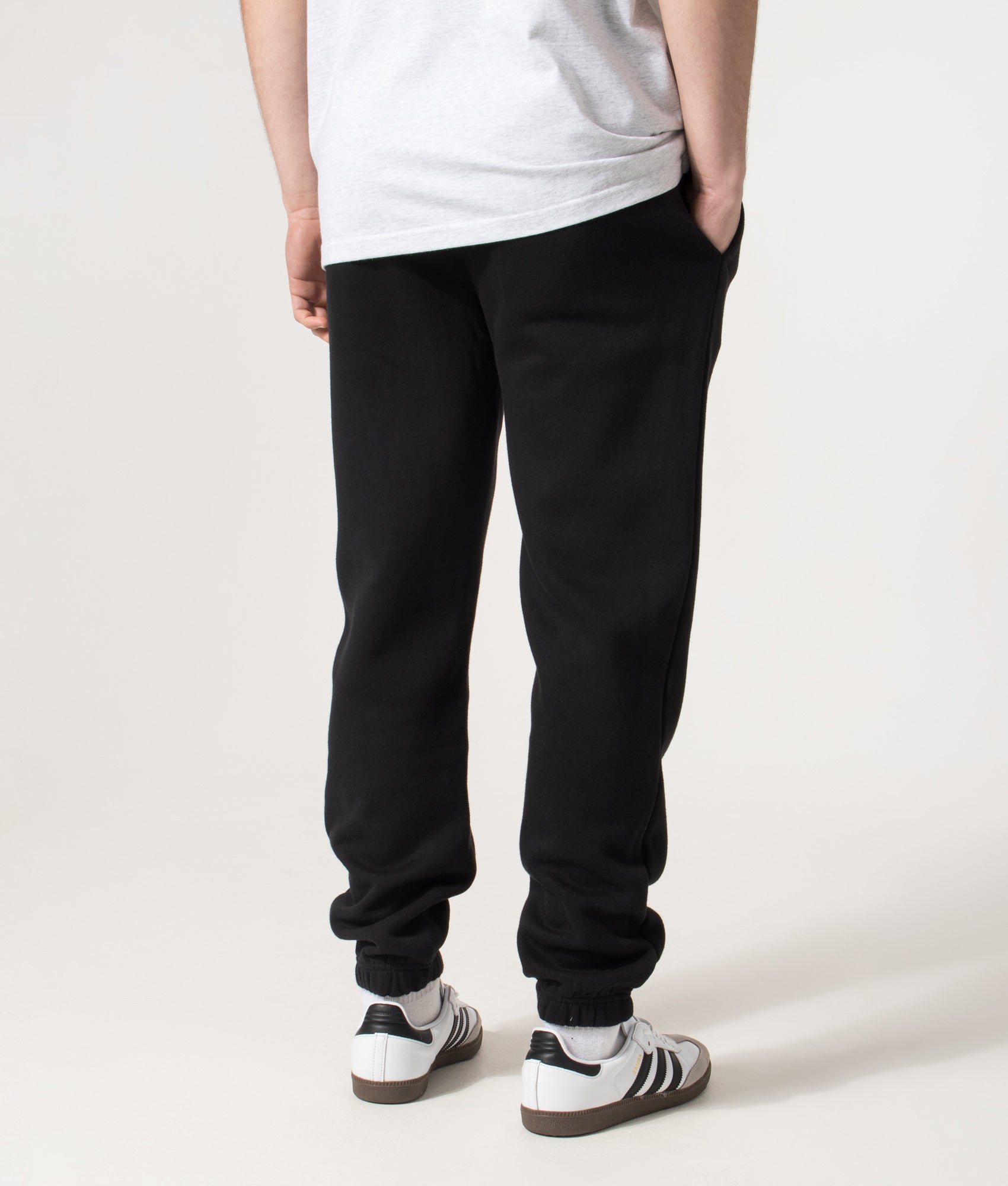 Marshall Artist Marchio Joggers in Black at EQVVS Menswear. Angled model back shot.