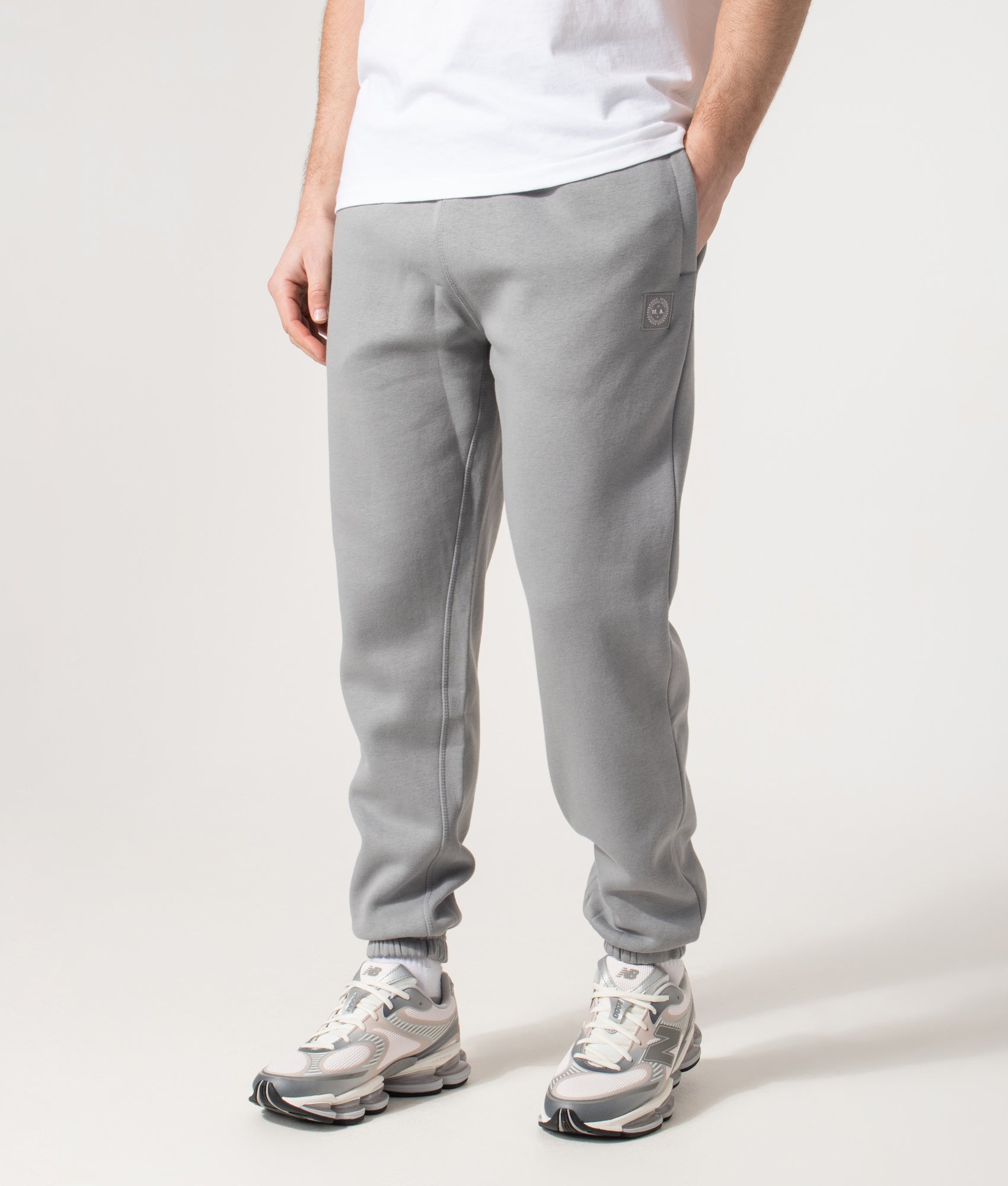 Marshall Artist Marchio Joggers in Grey at EQVVS Menswear. Angled model front shot.