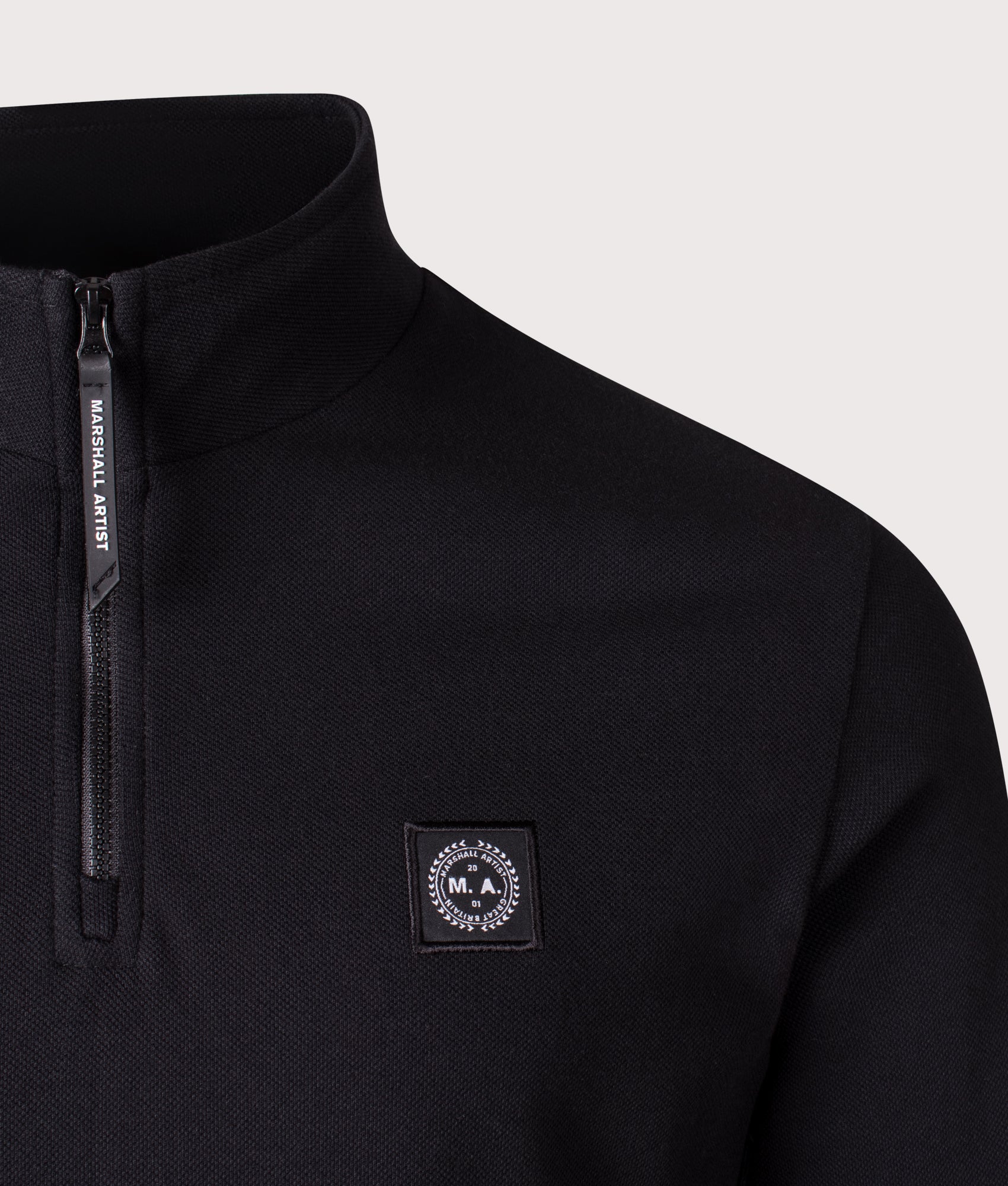 Marchio Piqué Quarter Zip Sweatshirt by Marshall Artist in Black. Shot by EQVVS. Detail shot.
