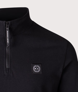 Marchio Piqué Quarter Zip Sweatshirt by Marshall Artist in Black. Shot by EQVVS. Detail shot.