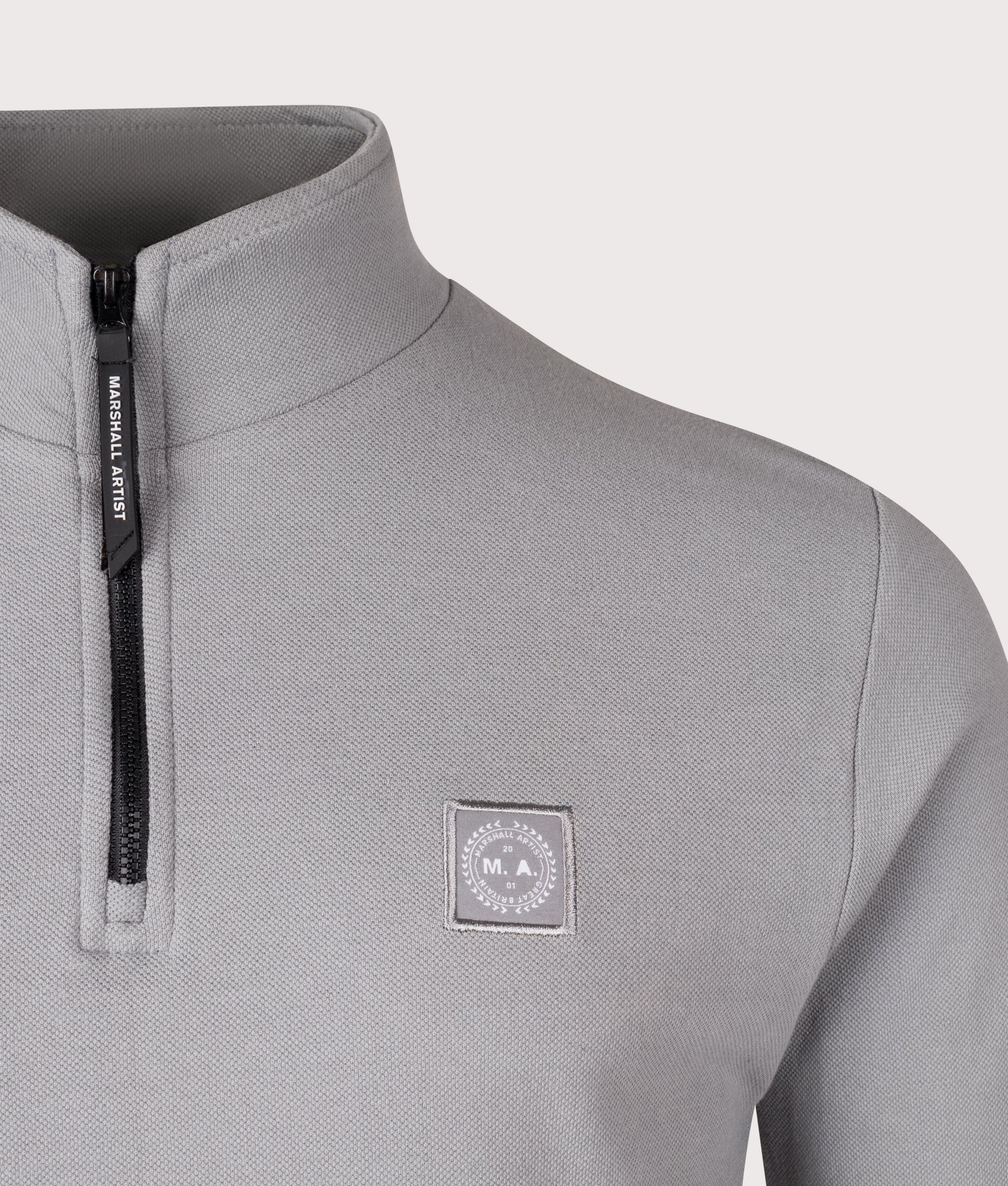 Marchio Piqué Quarter Zip Sweatshirt by Marshall Artist in Nardo Grey. Shot by EQVVS. Front shot.