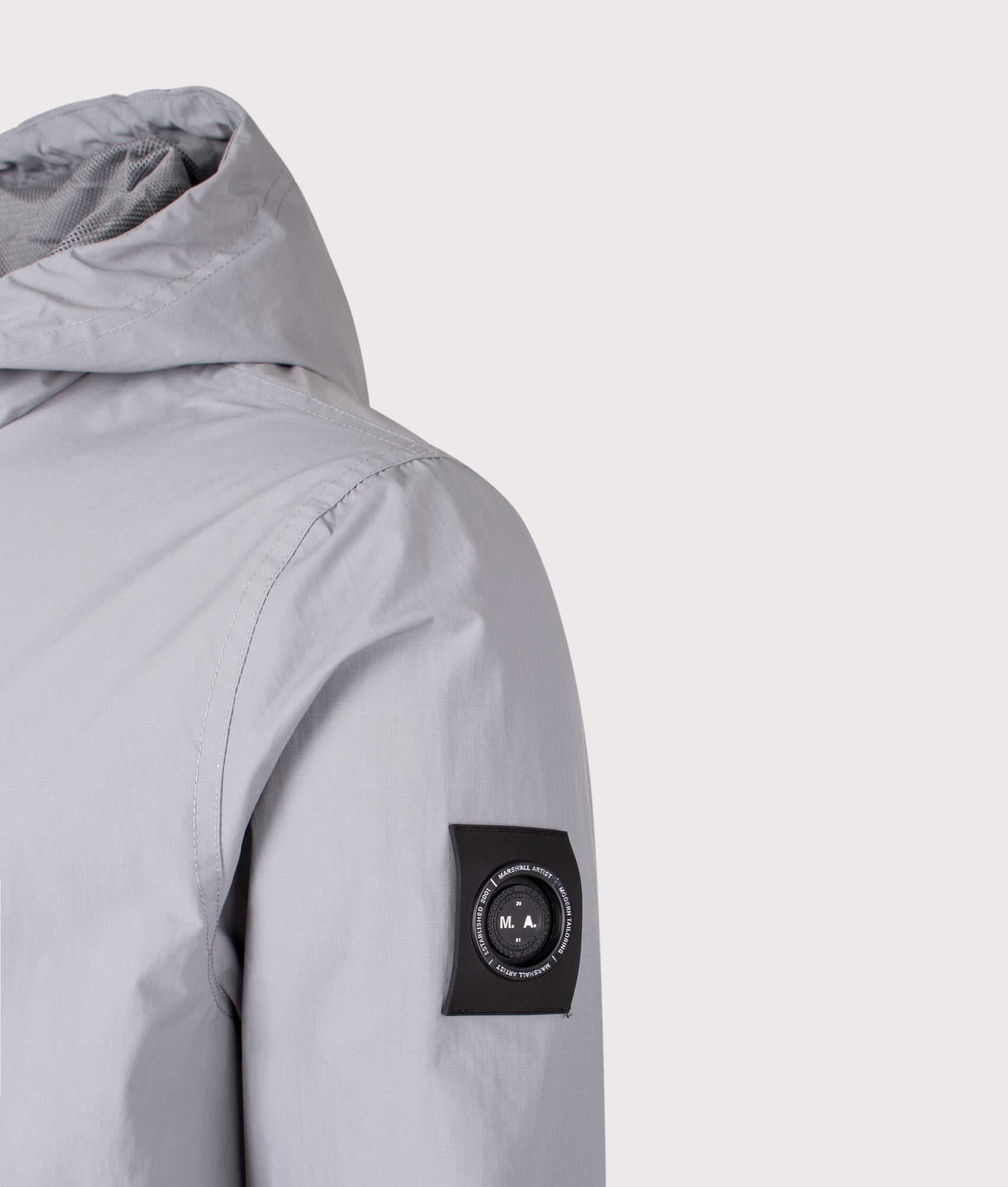 Alpha Lightweight Jacket in Nardo Grey. | Marshall Artist | Shot at EQVVS | Front angle detail shot 