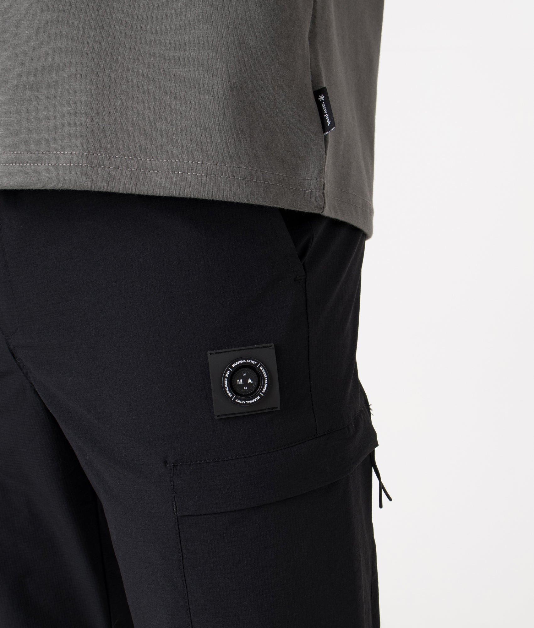 Lennox Cargo Pants by Marshall Artist in Black. Shot by EQVVS. Detail shot.