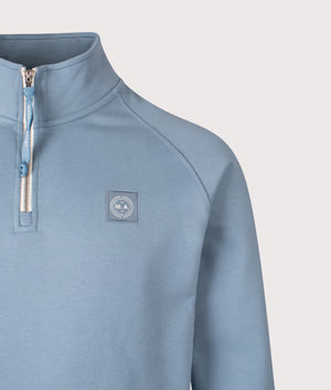 Foundation Quarter Zip Sweatshirt in Steel Blue | 100% Cotton | Marshall Artist | Shot at EQVVS | Front detail shot 