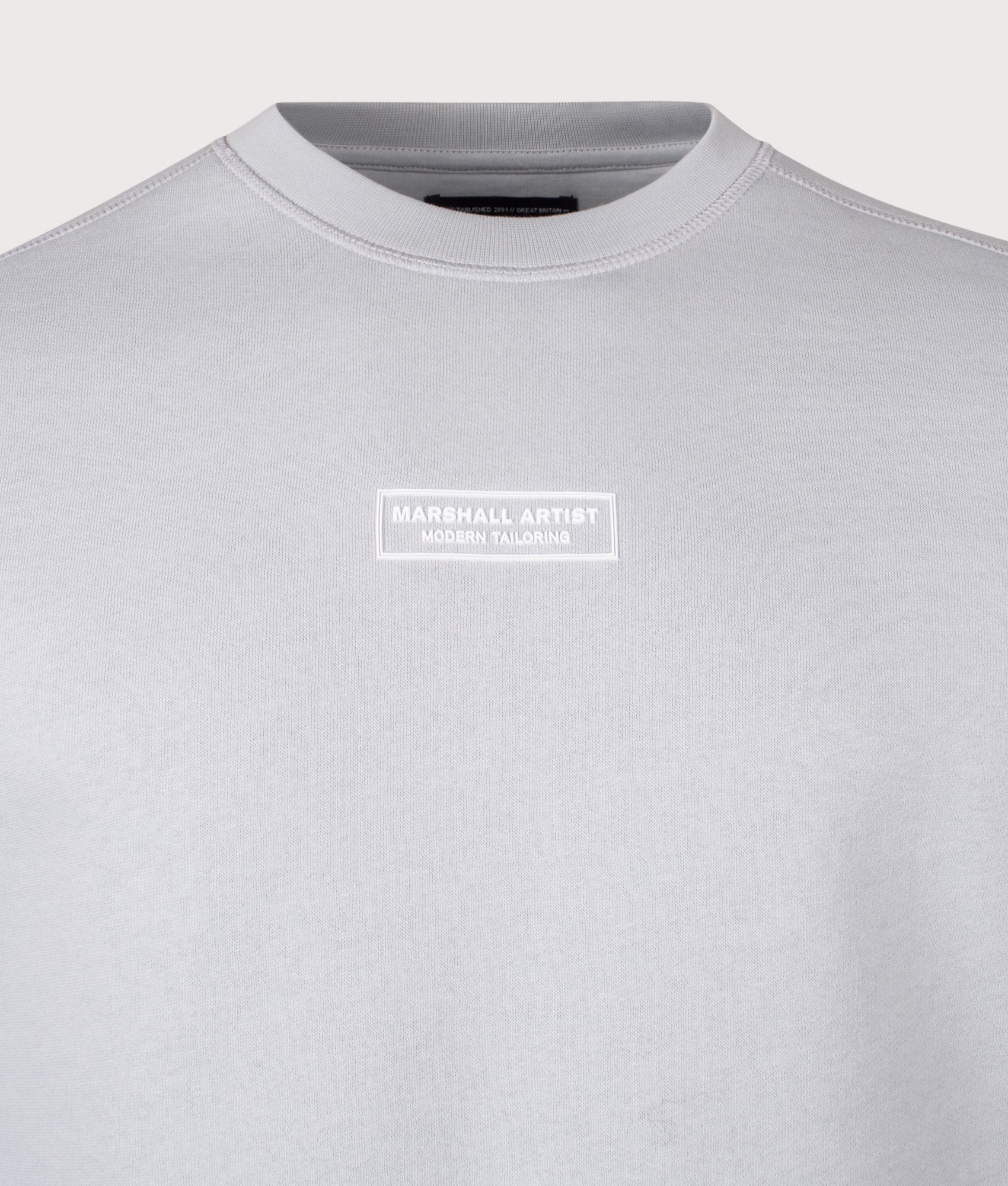 Siren Sweatshirt arrives in Ghost Grey | 100% Cotton | Marshall Artist | Shot at EQVVS | Front detail shot
