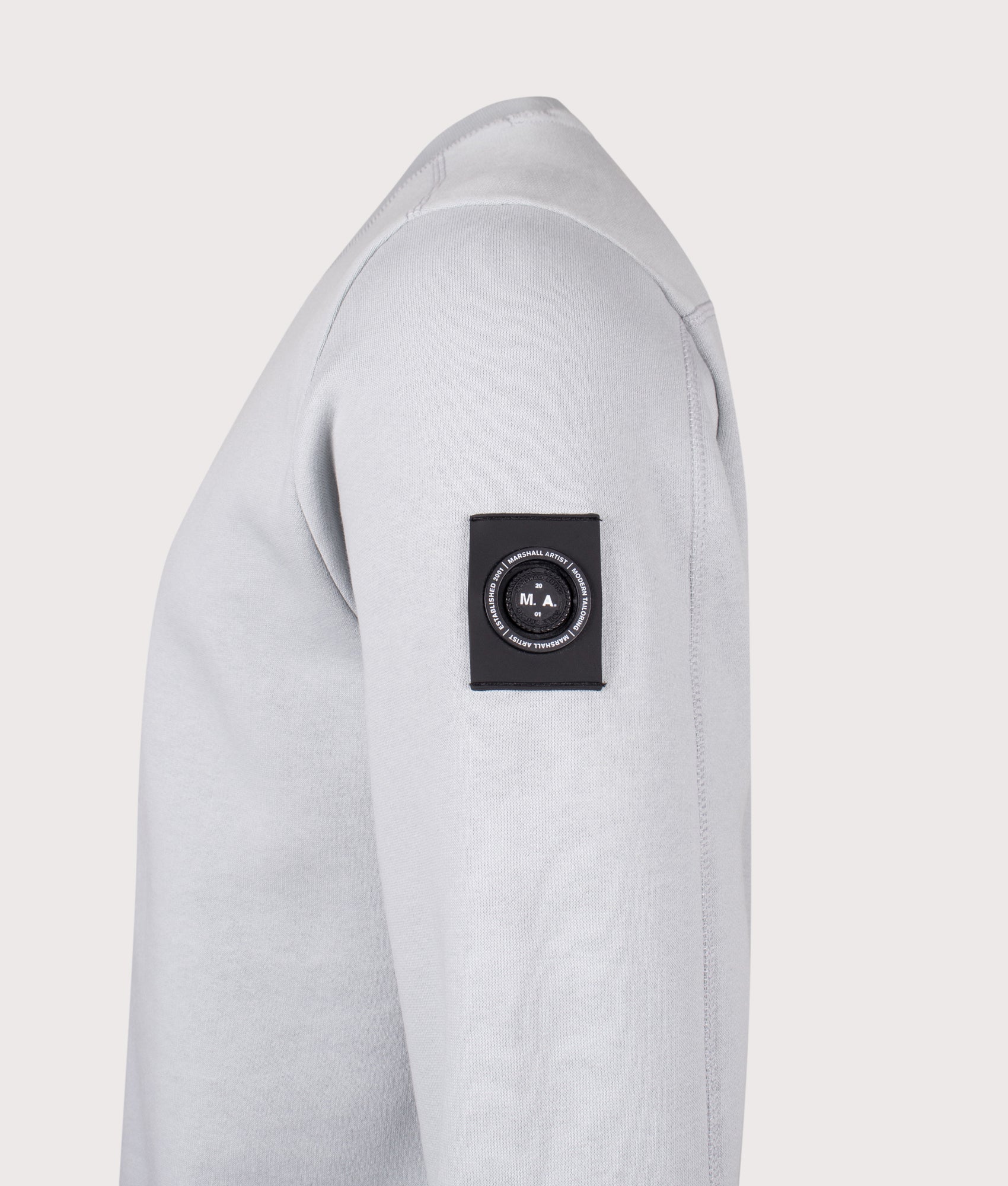 Siren Sweatshirt arrives in Ghost Grey | 100% Cotton | Marshall Artist | Shot at EQVVS | Side detail shot 