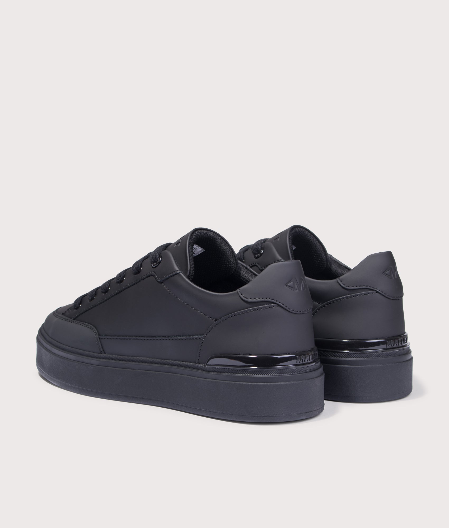 Lansbury Trainers in Triple Black | OrthoLite® HybridPlus | Mallet branding | EQVVS | Back angle shot 