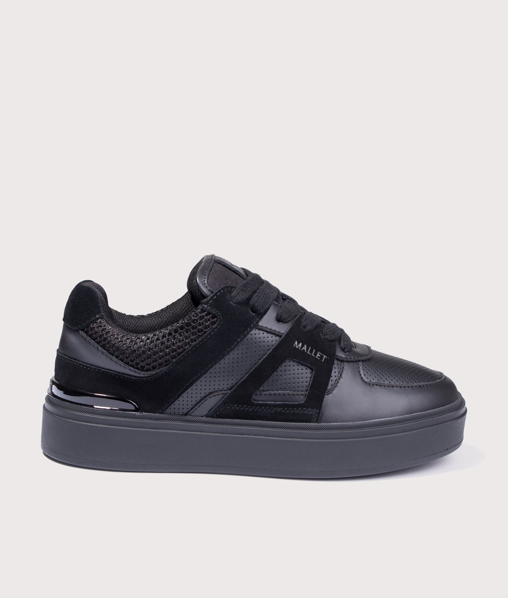 Mallet Fenchurch Trainers in Triple Black at EQVVS Menswear. Side shot.