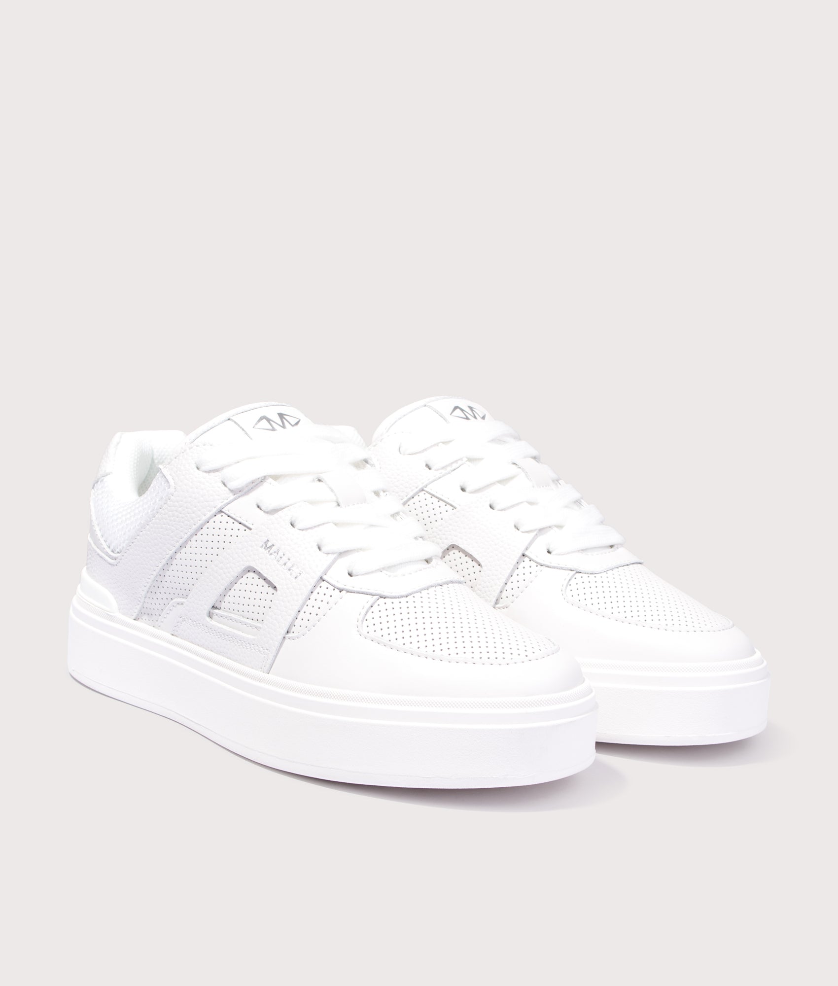 Mallet Fenchurch Trainers in Triple White at EQVVS Menswear. Angled front shot.