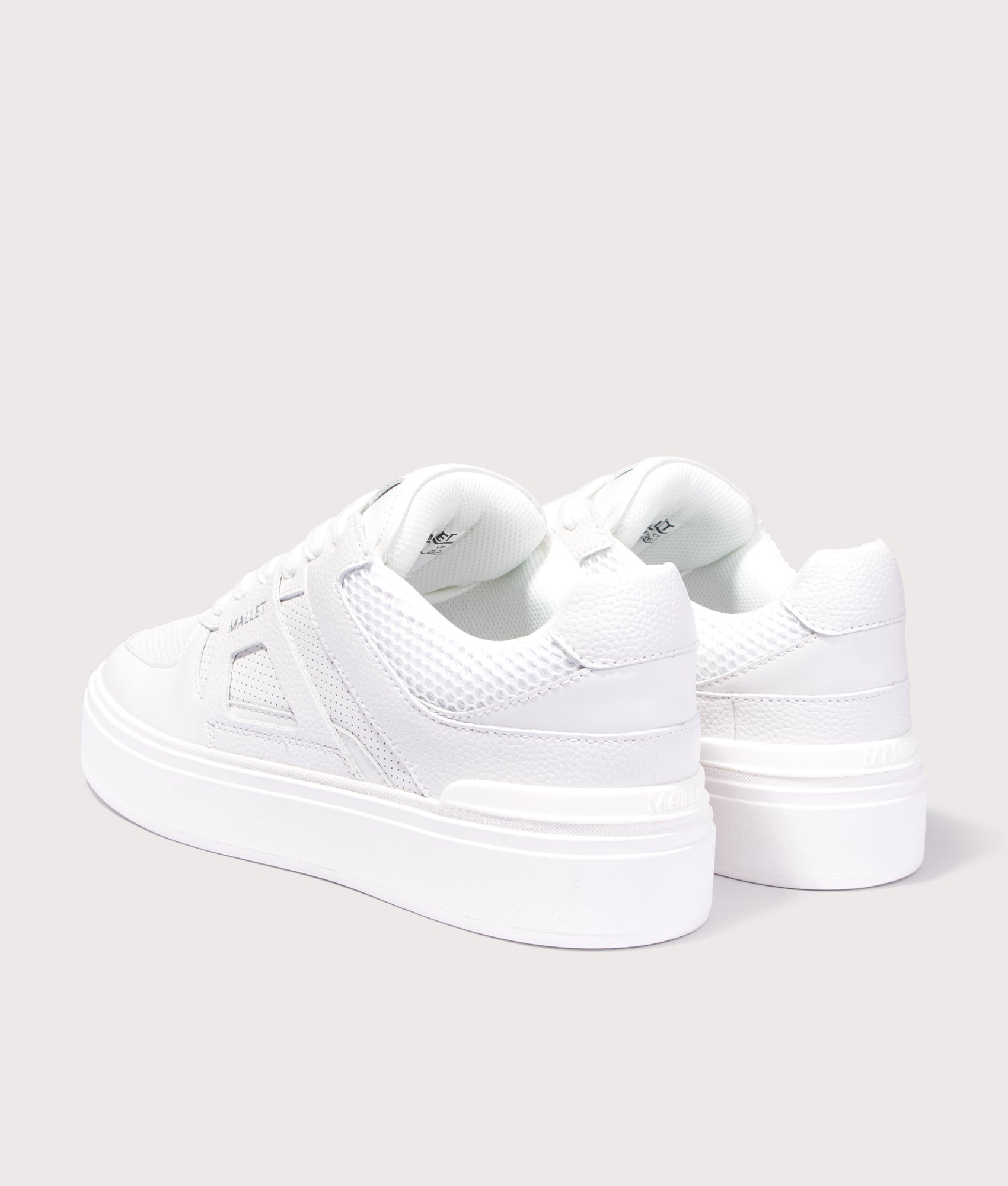 Mallet Fenchurch Trainers in Triple White at EQVVS Menswear. Angled back shot.