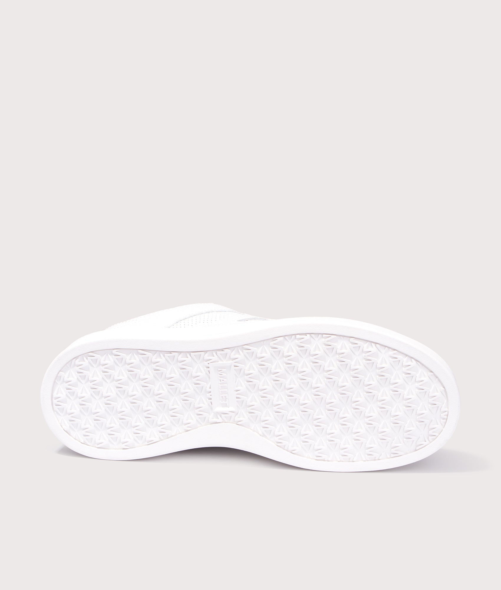 Mallet Fenchurch Trainers in Triple White at EQVVS Menswear. Tread shot.